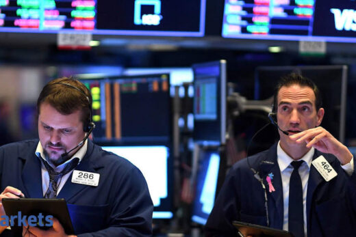 Dow Jones shares: Dow Jones drops as stimulus rally cools, Tesla at record high