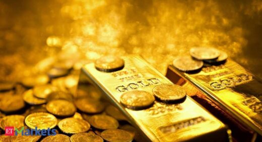 Gold jumps 1% on dollar slide, US stimulus progress