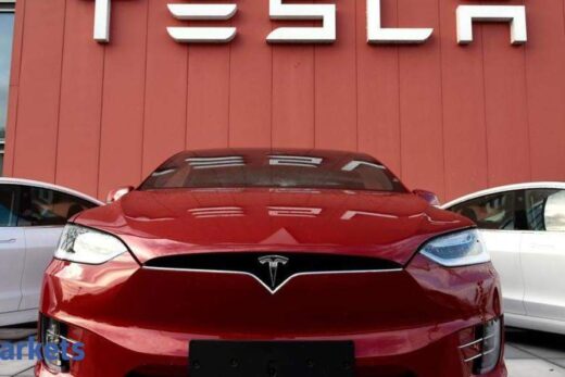 Tesla shares rise in busy trade ahead of S&P 500 debut