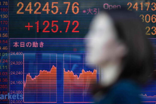 Japan shares end lower on vaccine delay, caution ahead of earnings season