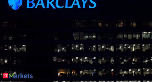 Barclays resumes dividend payouts as annual profit halves