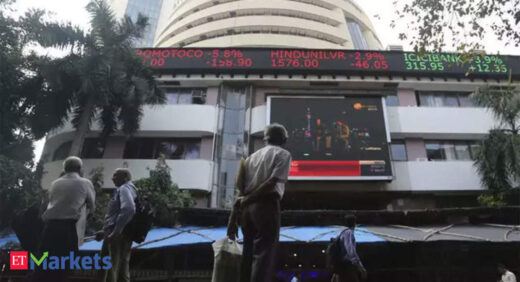 Sensex drops 291 points, Nifty holds above 15K; Tata Motors plunges 5%