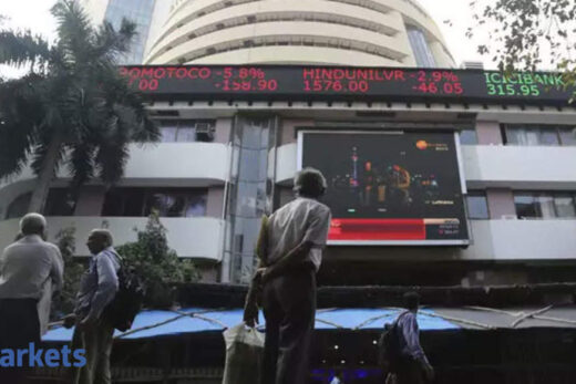 Sensex drops 291 points, Nifty holds above 15K; Tata Motors plunges 5%