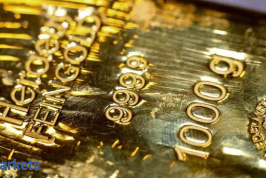 Gold near 2-week lows after strong US data lifts dollar, yields