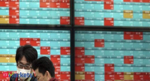 Japan shares end lower on Evergrande woes, bargain-buying limits losses