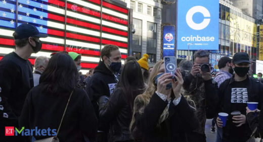 coinbase share price: Coinbase shares jump 11% day after Nasdaq debut